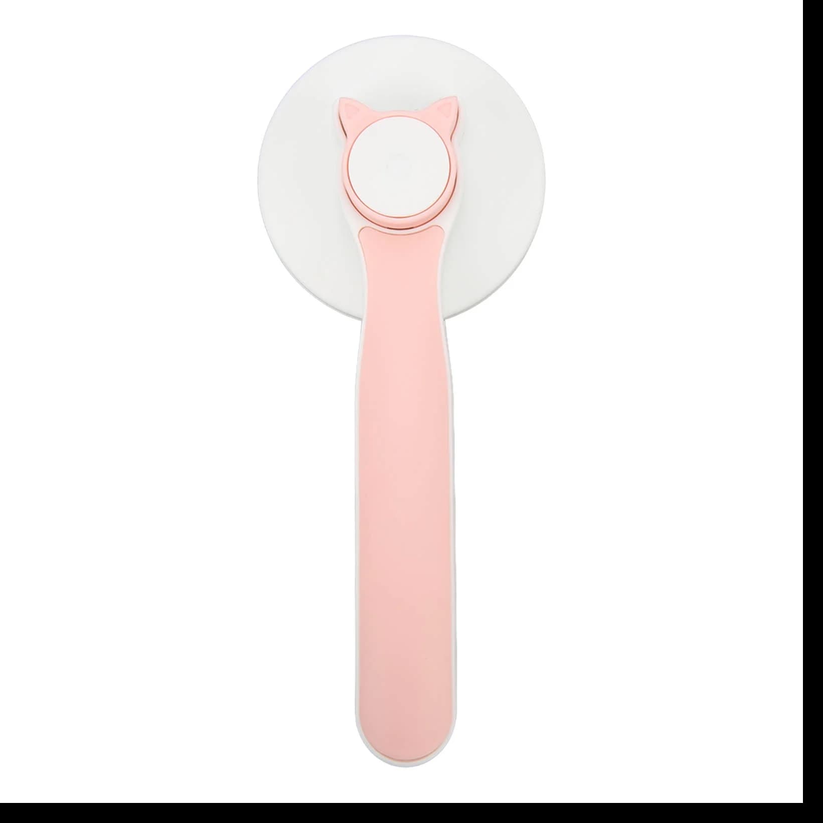 Self cleaning grooming brush